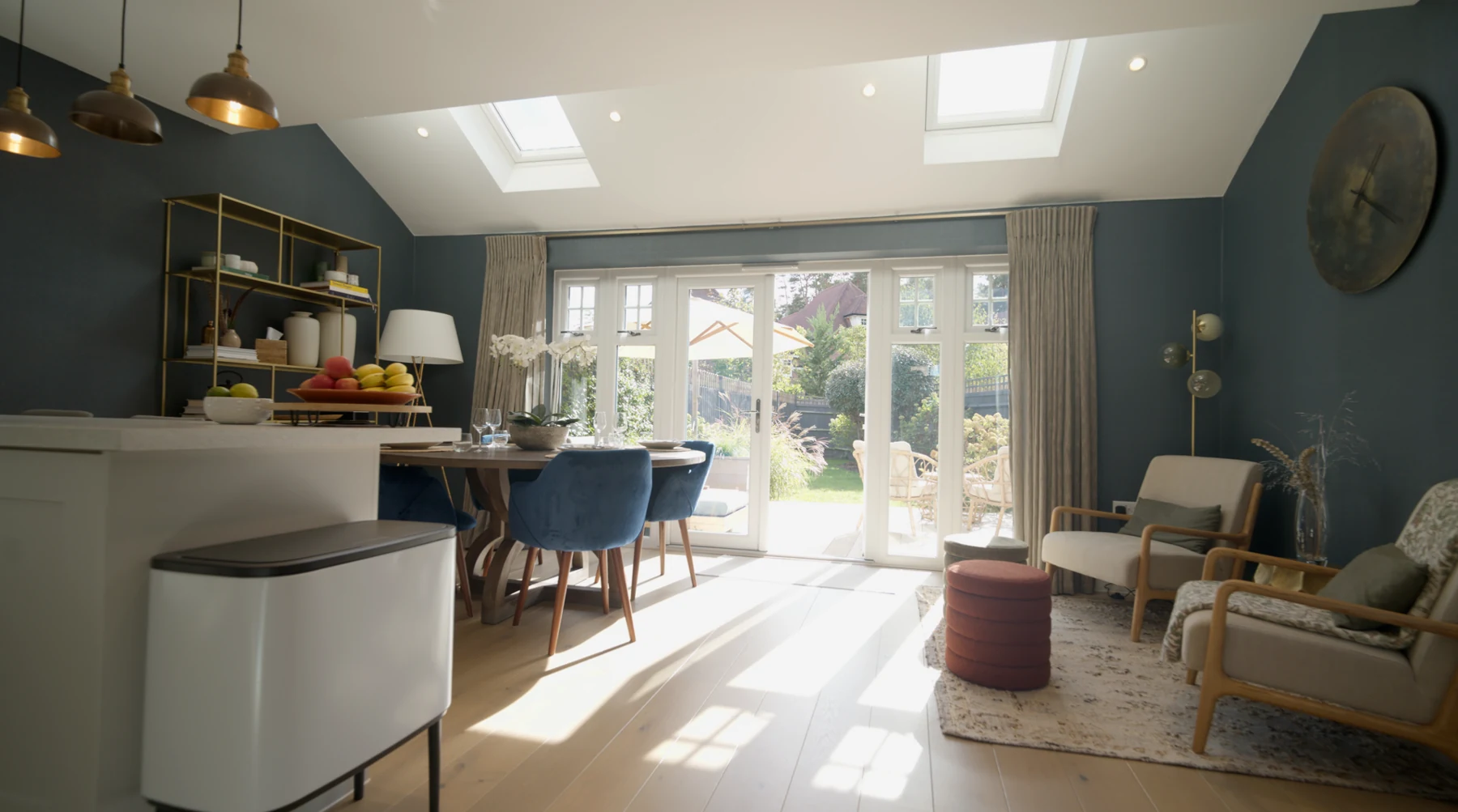 Open plan kitchen and dining room with garden doors, filmed by Dylan